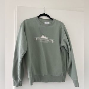 TNA green sweatshirt